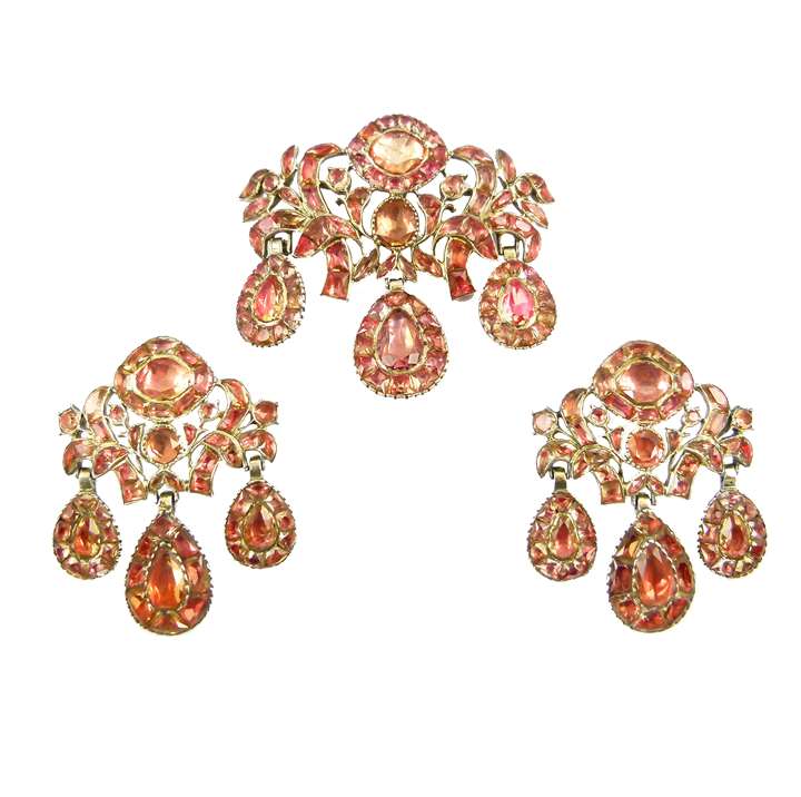 18th century orange foiled topaz triple drop pendant and pair of earrings en suite